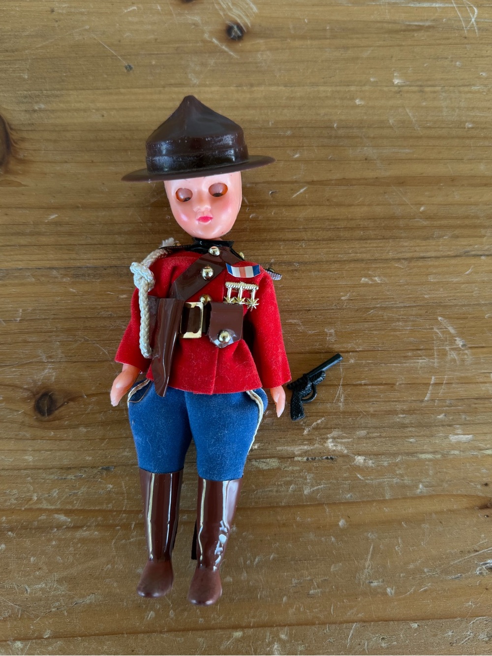 Vintage-Inspired Red Mountie Doll Toy with Blue Pants